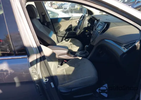 2014 Hyundai Santa Fe Sport 2.4L z USA, uszkodzony, nr VIN 5XYZUDLB4EG212076